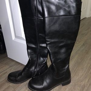 Tall black leather boots